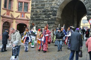 A few of the feather-guys.  Even kids participate.  And the masks and costumes get passed down generations in their families, which is cool. And not just anybody can participate - you have to part of these clubs.
